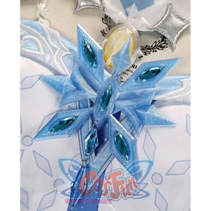 Tsaritsa cosplay costume chest ornament close-up with blue gem-like pieces in a snowflake design.