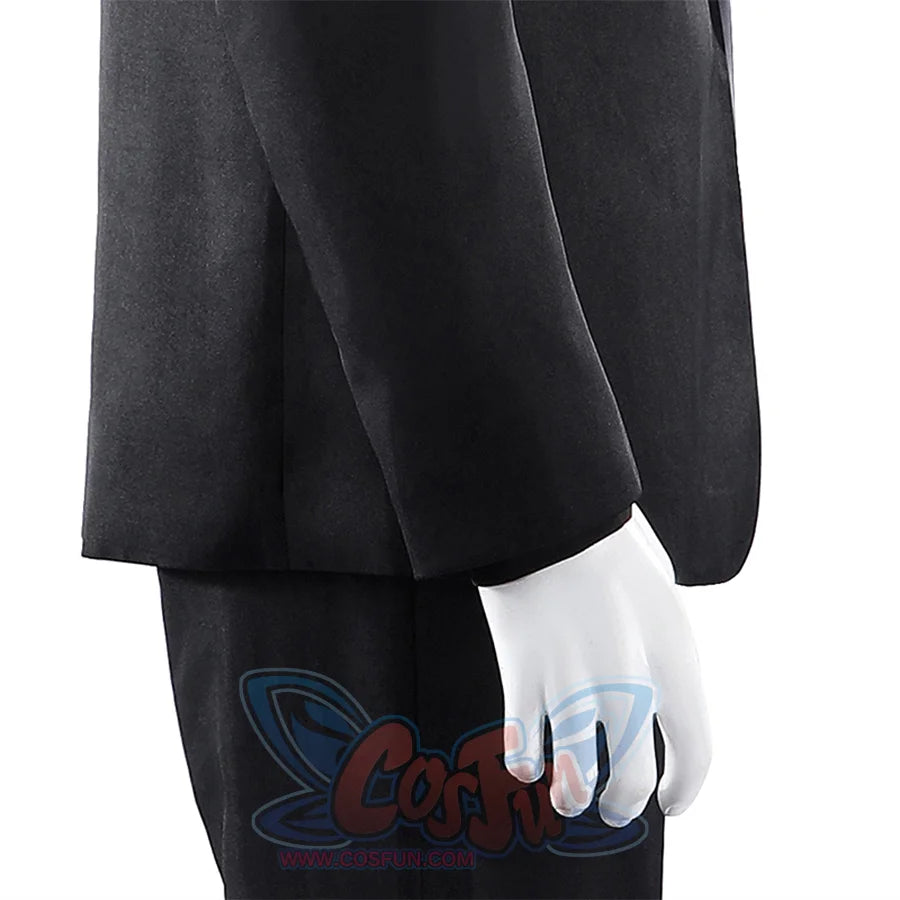 Harvey Dent Two-Face cosplay sleeve detail drops the black jacket cuff beside matching dark pants.