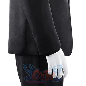 Harvey Dent Two-Face cosplay sleeve detail drops the black jacket cuff beside matching dark pants.