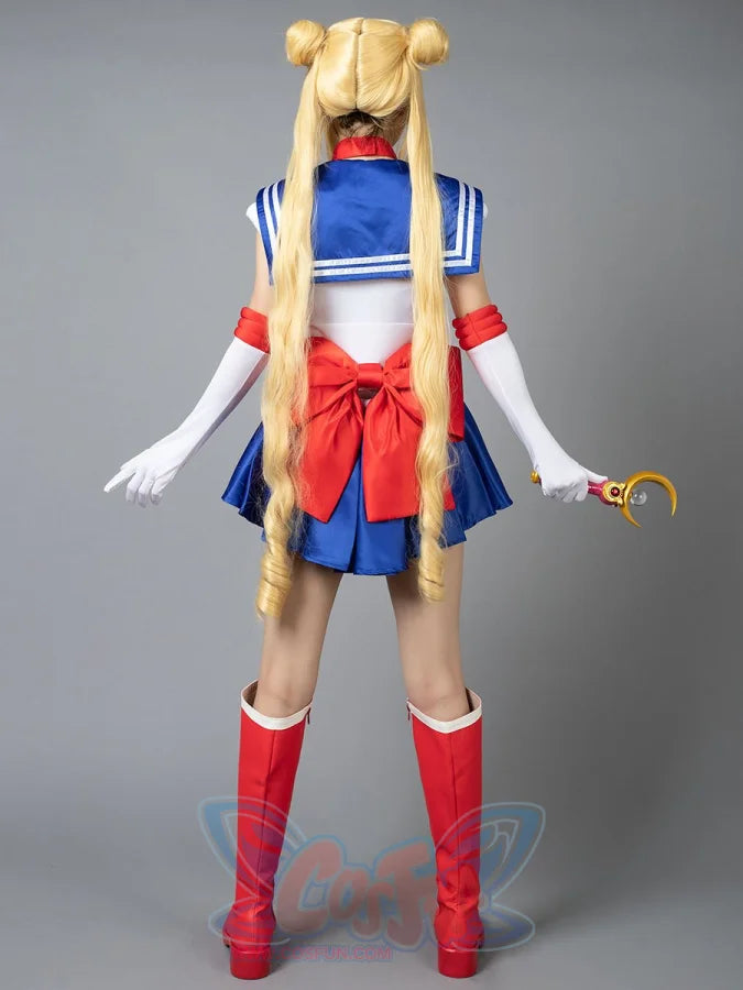 Usagi Tsukino cosplay costume angled pose frames the red bow above blue skirt movement