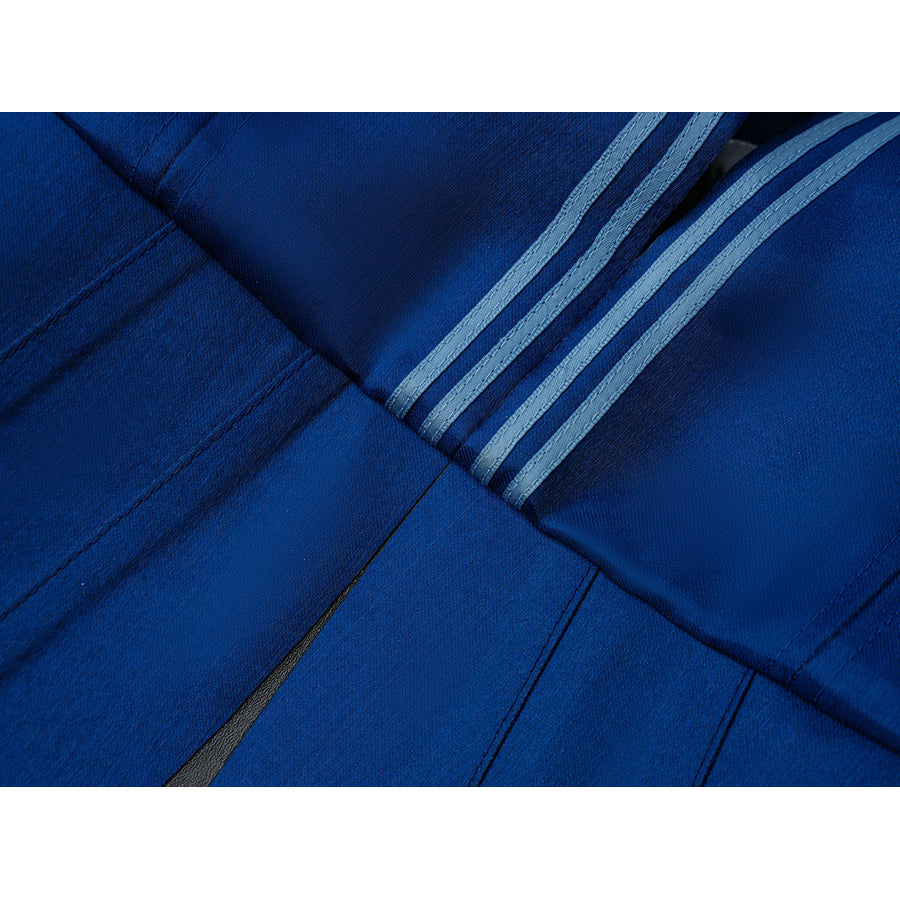 Velina Airgid cosplay blue pleat detail highlights striped trim set over the satin skirt fabric.