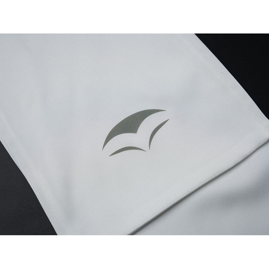 Velina Airgid cosplay head scarf detail focuses on a gray emblem printed on smooth white fabric.