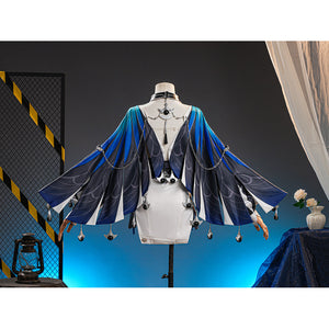 Velina Airgid cosplay costume centers blue and black gradient capelet with silver-tone chain accents over a white strapless.