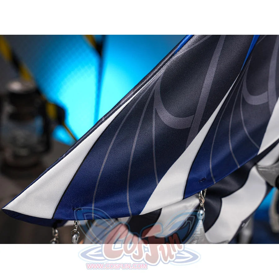 Velina Airgid cosplay costume traces intricate patterns across the satin capelet panels while highlighting hanging accents.