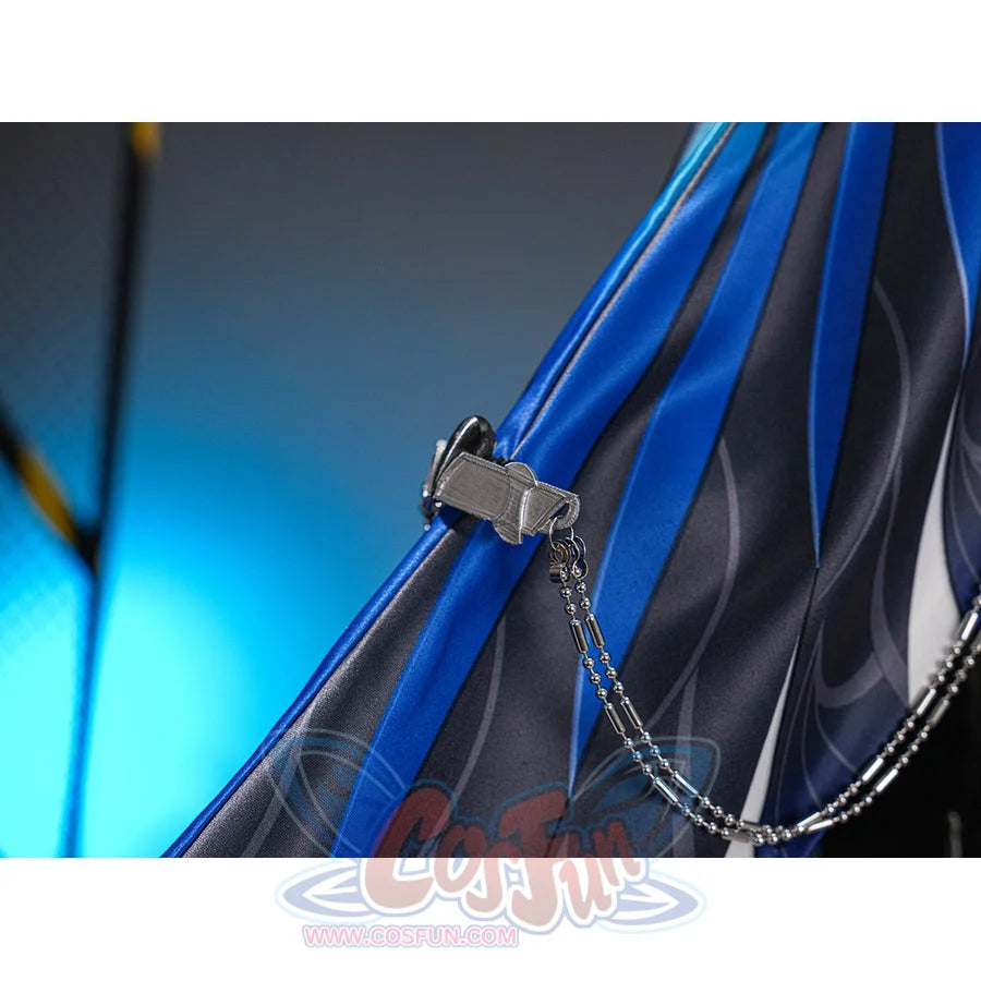 Velina Airgid cosplay costume anchors a metallic silver-tone chain to the pleated blue and dark grey patterned fabric panels.