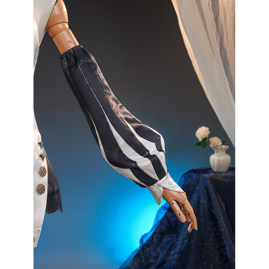 Velina Airgid cosplay costume frames the arm with a dramatic black and white striped satin sleeve and scalloped cuff.