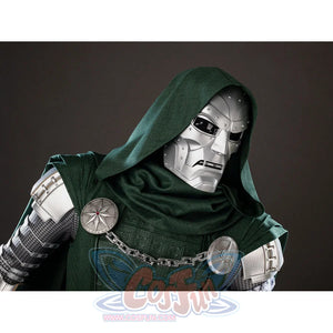 Victor Von Doom cosplay costume frames the metallic mask under a green hood between chain and cape brooches.