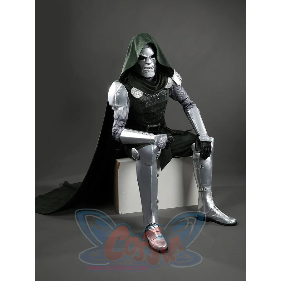 Doom Victor von Doom cosplay costume anchors silver leg armor beneath the green tunic.