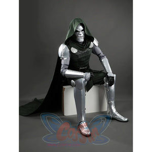 Doom Victor von Doom cosplay costume anchors silver leg armor beneath the green tunic.