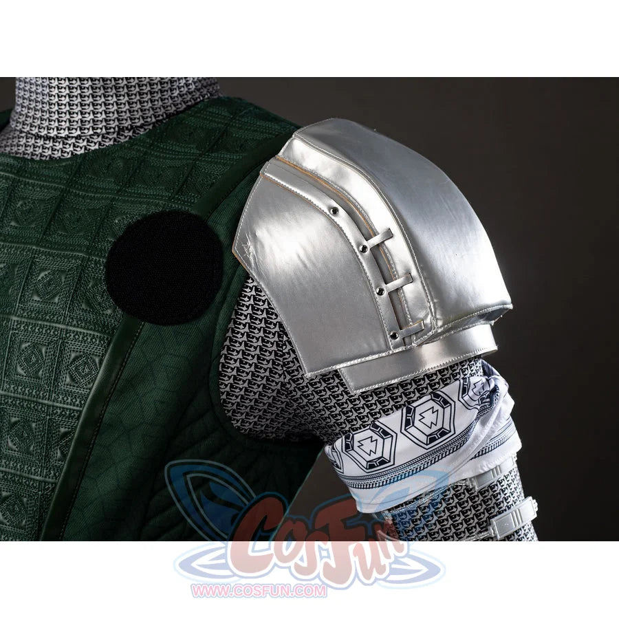 Victor Von Doom cosplay costume sets silver-tone shoulder armor beside textured green chest panels and sleeve trim.