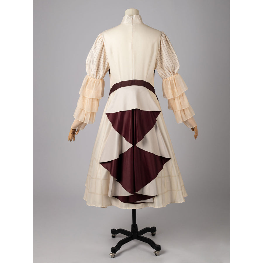 Violet Evergarden cosplay costume back view gathers deep maroon panels over the cream skirt with tiered ruffled sleeves.