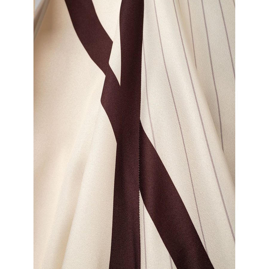 Violet Evergarden cosplay costume fabric layers anchor deep brown trim against soft cream material with vertical lines.
