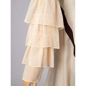 Violet Evergarden cosplay costume has tiered sheer fabric layers on the sleeve that create a soft and elegant aesthetic.