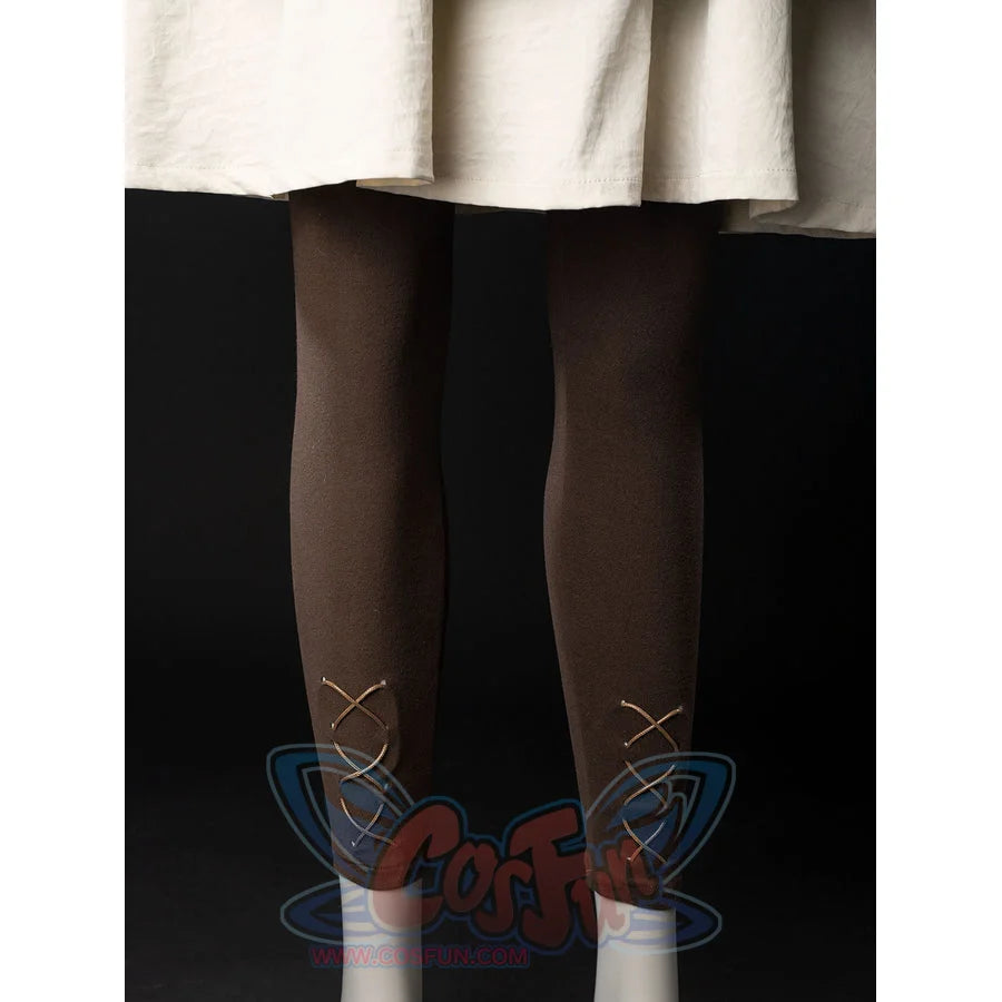 Witch Hat Atelier Coco Tetia Richeh cosplay leggings detail laces brown fabric below the cream robe hem.