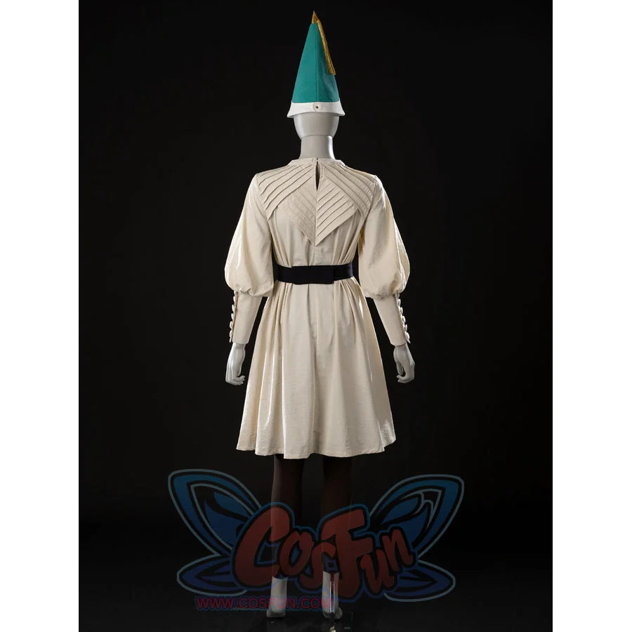 Witch Hat Atelier Coco Tetia Richeh cosplay robe back view gathers cream fabric beneath the black waist sash.