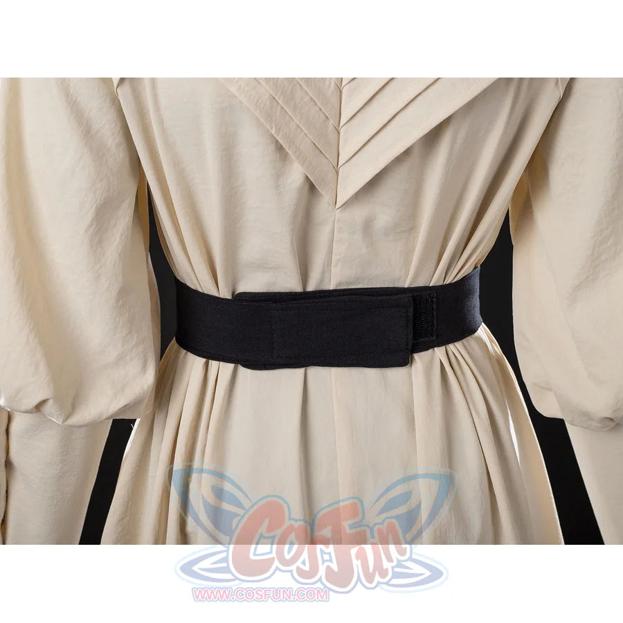 Witch Hat Atelier Coco Tetia Richeh cosplay waist sash back detail gathers cream robe folds beneath a wide black band.