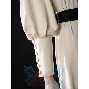 Witch Hat Atelier Coco Tetia Richeh cosplay sleeve cuff detail lines cream buttons along a gathered puff sleeve.