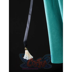 Witch Hat Atelier Coco Tetia Richeh cosplay tassel detail drops from a dark cord along the teal cloak edge.