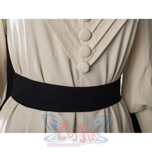 Witch Hat Atelier Coco Tetia Richeh cosplay waist sash detail anchors cream robe folds beneath a wide black band.