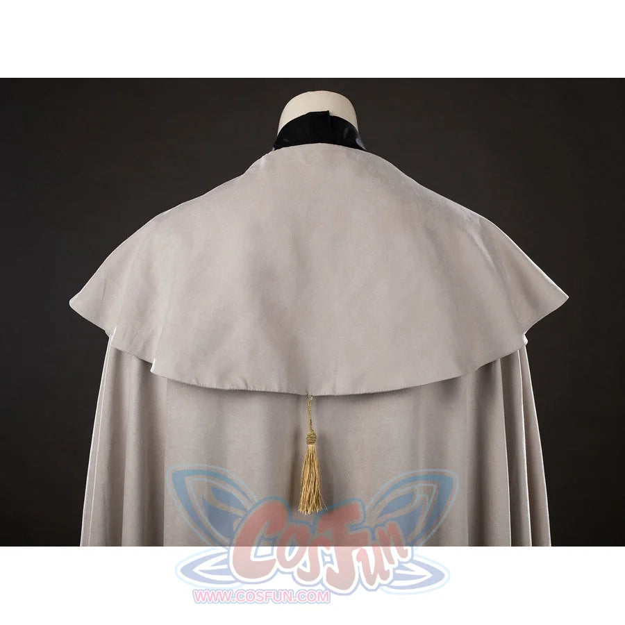 Witch Hat Atelier Qifrey cosplay cape back detail spreads a broad cream shoulder panel above the tassel.