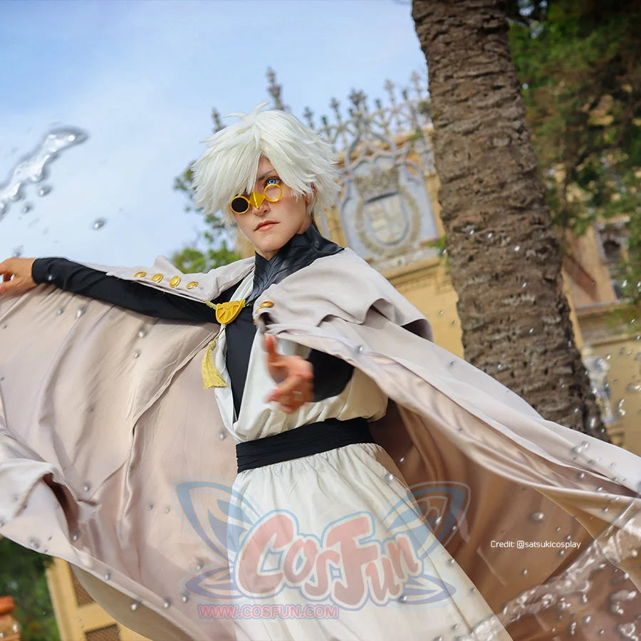Witch Hat Atelier Qifrey cosplay costume action view spreads the pale cape around a white robe and black belt.