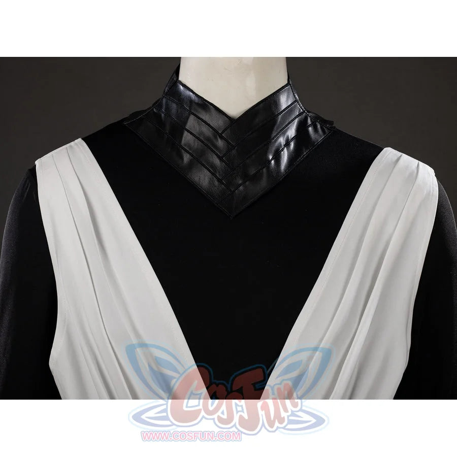 Witch Hat Atelier Qifrey cosplay robe neckline detail crosses white panels beneath the black collar.