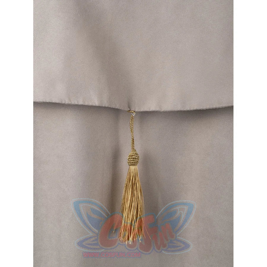 Witch Hat Atelier Qifrey cosplay tassel detail drops a gold-tone charm from the center back cape.