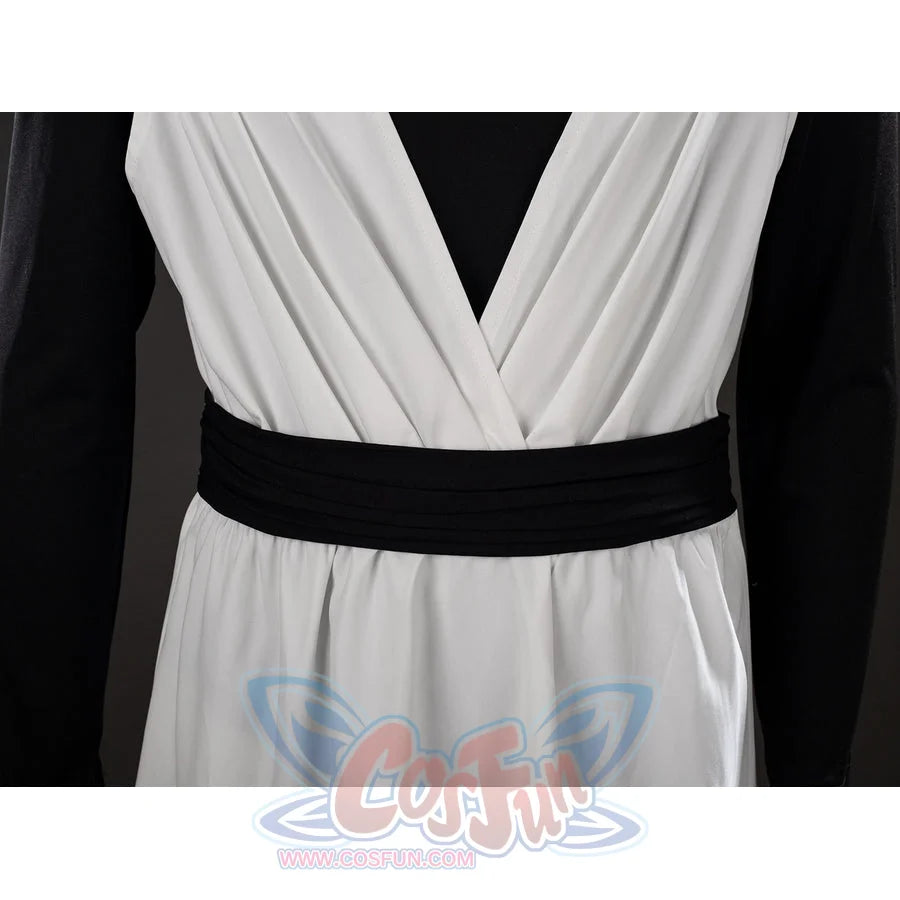 Witch Hat Atelier Qifrey cosplay waist sash detail wraps black fabric over the crossed white robe panels.