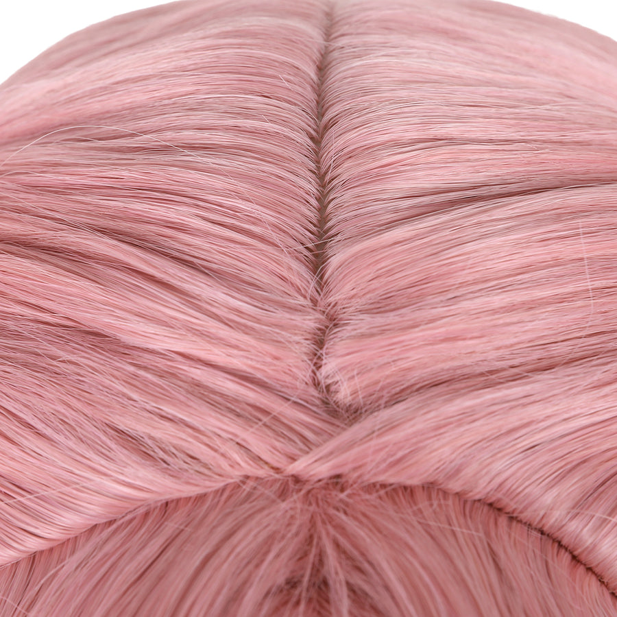 Witch Hat Atelier Tetia cosplay wig close-up shows the pink fiber parting and blended gradient strands.