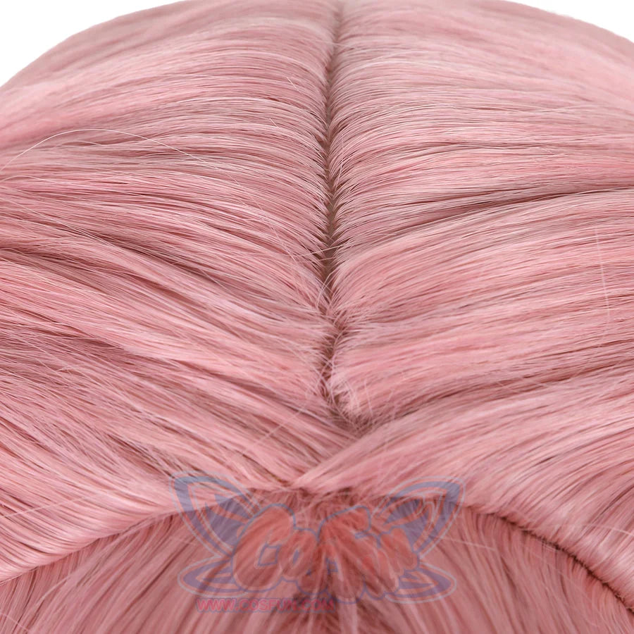Witch Hat Atelier Tetia cosplay wig close-up shows the pink fiber parting and blended gradient strands.