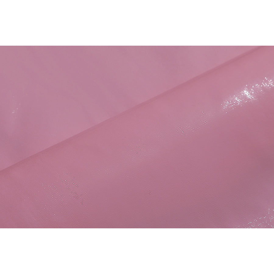 Wuthering Waves Aemeath cosplay pink glossy panel detail reflects light across a soft strap or bow material.