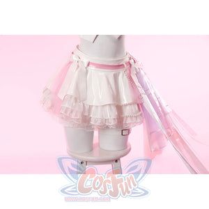 Wuthering Waves Aemeath cosplay side-waist bow falls over the skirt in pink gauze, silver-tone chain, and long ribbon tails.