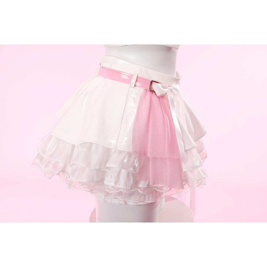 Wuthering Waves Aemeath cosplay skirt front detail sets a pink belt and bow above layered white ruffles.