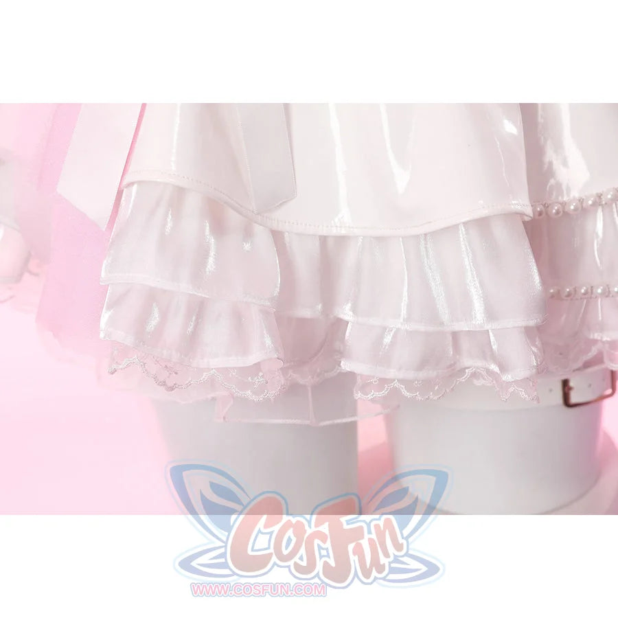 Wuthering Waves Aemeath cosplay skirt ruffle detail stacks glossy white tiers above lace trim and pumpkin shorts.