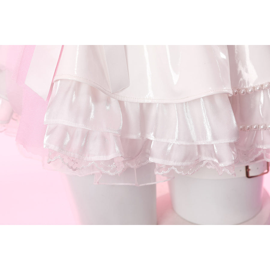 Wuthering Waves Aemeath cosplay skirt ruffle detail stacks glossy white tiers above lace trim and pumpkin shorts.