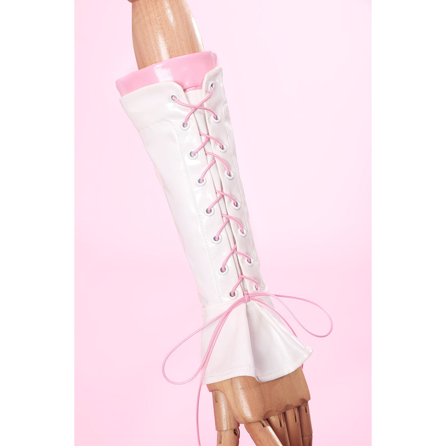 Wuthering Waves Aemeath cosplay sleeve detail laces pink cord through a white arm cover and flared cuff.