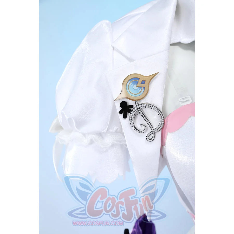 Wuthering Waves Denia cosplay sleeve brooch detail pins gold-tone buttons and charms beside white puff fabric.