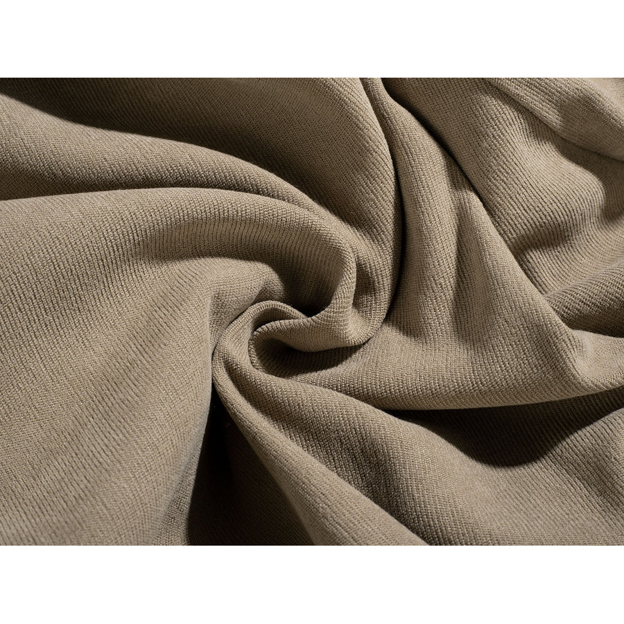 Yoda Master cosplay costume layers soft beige knit fabric in deep flowing folds to frames the texture of the material.