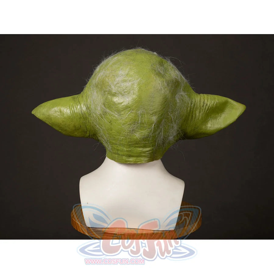 Yoda Master cosplay headpiece and claws curves around the cranium while highlighting soft wispy hair and green texture.