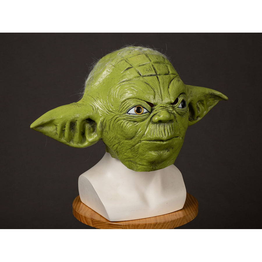 Yoda Master cosplay headpiece and claws capture the textured green latex skin with large pointed ears and sharp eyes.