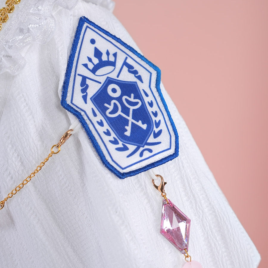 1883 Science and Medium Yongchu Taffy cosplay costume shirt presents blue embroidered crest patch and hanging gem-like charm.
