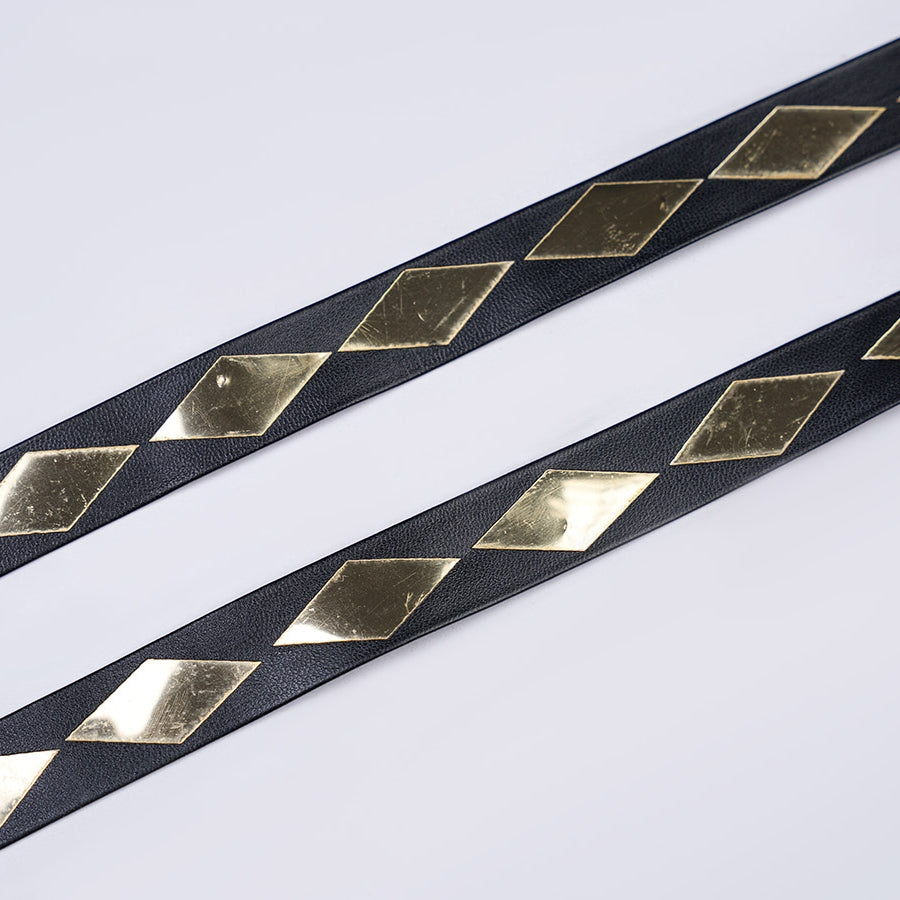 1883 Science and Medium Yongchu Taffy cosplay costume includes two black straps accented by gold-tone diamond shapes.