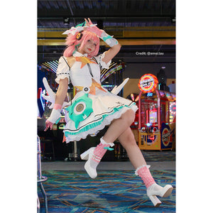 Zenless Zone Zero Aria cosplay costume frames teal skirt panels above pink leg covers.