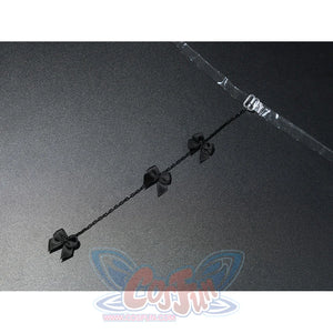 Zenless Zone Zero Ramiel cosplay costume back chain prop detail links small black bows across a thin strap.