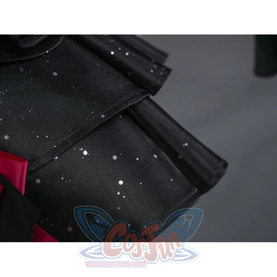 Zenless Zone Zero Ramiel cosplay costume skirt detail catches tiny light flecks across layered black fabric.