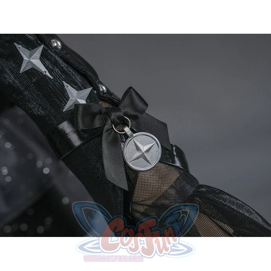 Zenless Zone Zero Ramiel cosplay costume star ring detail links silver hardware beside black fabric and mesh.