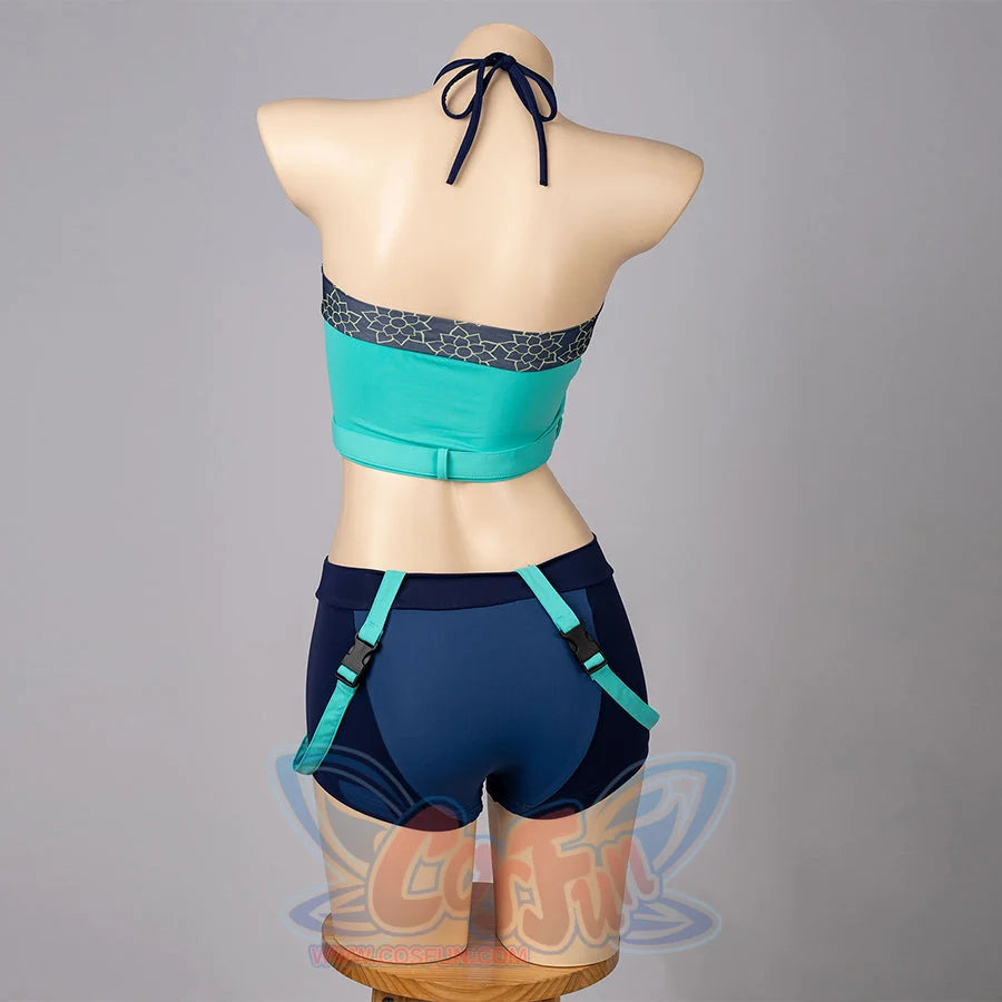 Zoey cosplay tankini back view ties a navy halter behind a teal top and navy shorts.