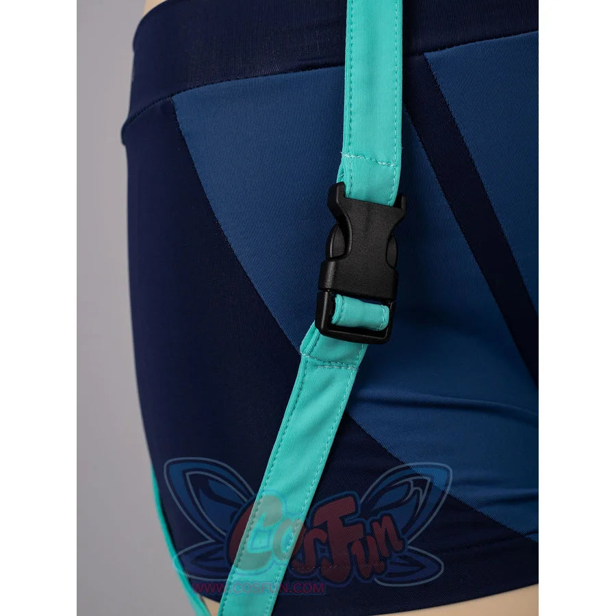 Zoey cosplay tankini hip strap detail anchors turquoise webbing and a black buckle over navy fabric.