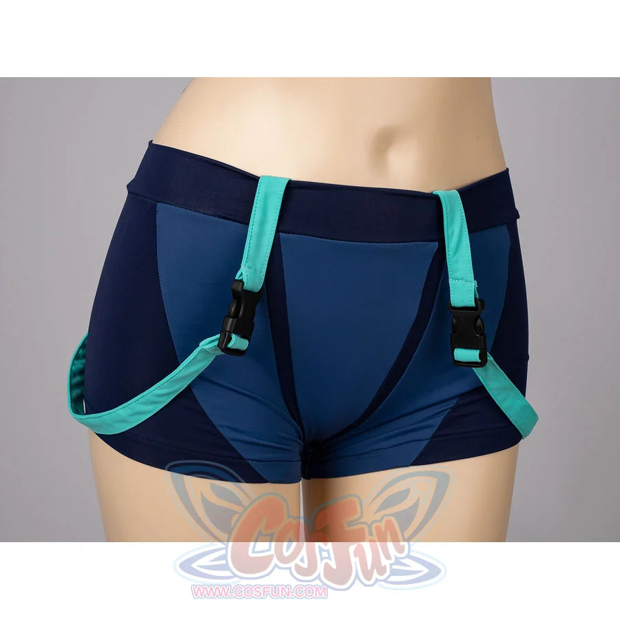 Zoey cosplay tankini shorts detail frames navy panels, turquoise straps, and clipped side loops.